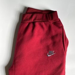 Maroon Nike sweatpants